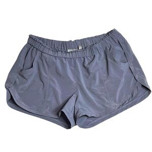 Athleta‎ athletic shorts Women’s size Medium in a Lilac Grey color
